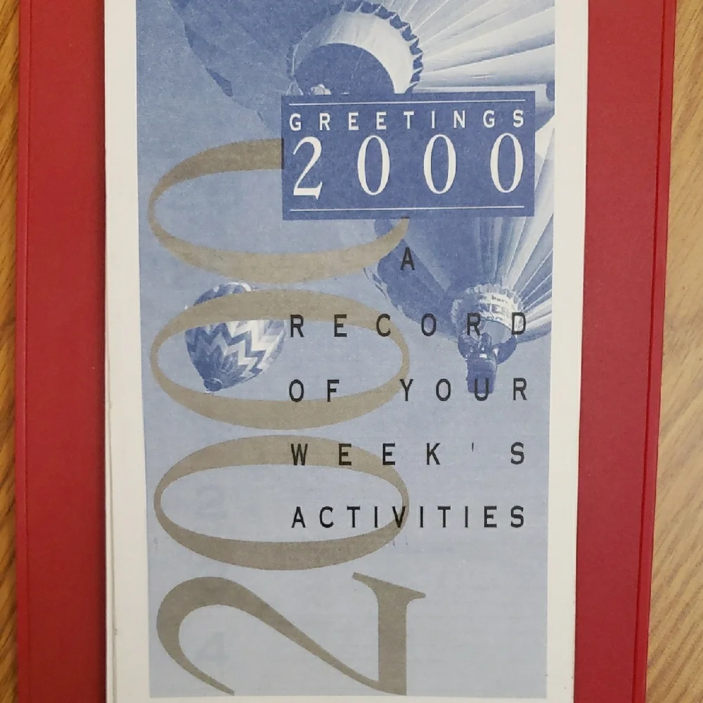 Weekly Activity Calendar with Red Clipboard